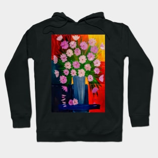 Mixed flowers in blue and silver vase on a colorful tiles background Hoodie